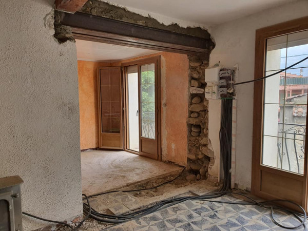 Ouverture de façade et plancher à Bompas